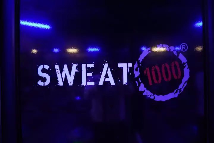 Oracle Signs Texas - Photo of an architectural sign for SWEAT 100 fitness